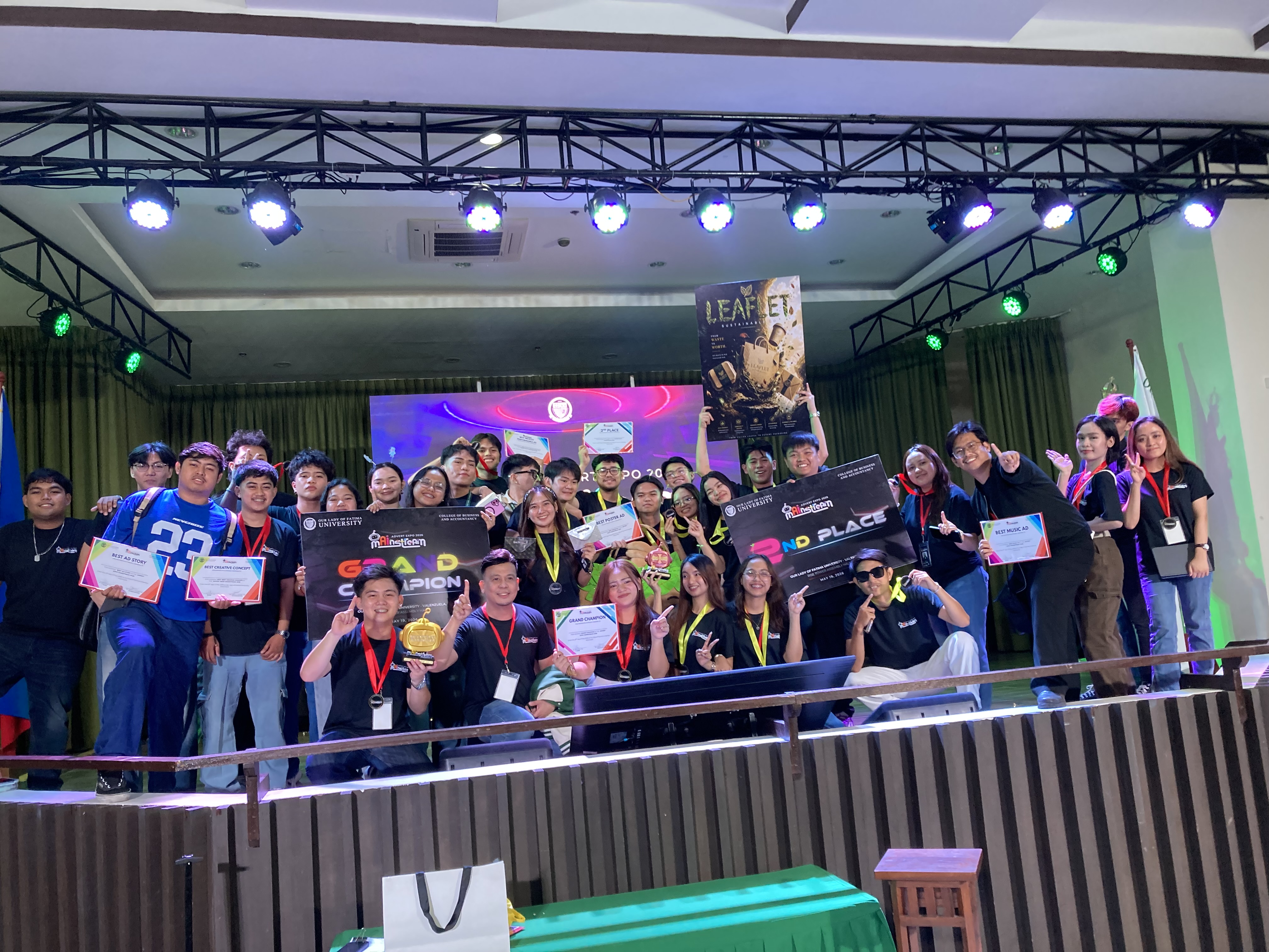 Mainstream team on stage with certificates