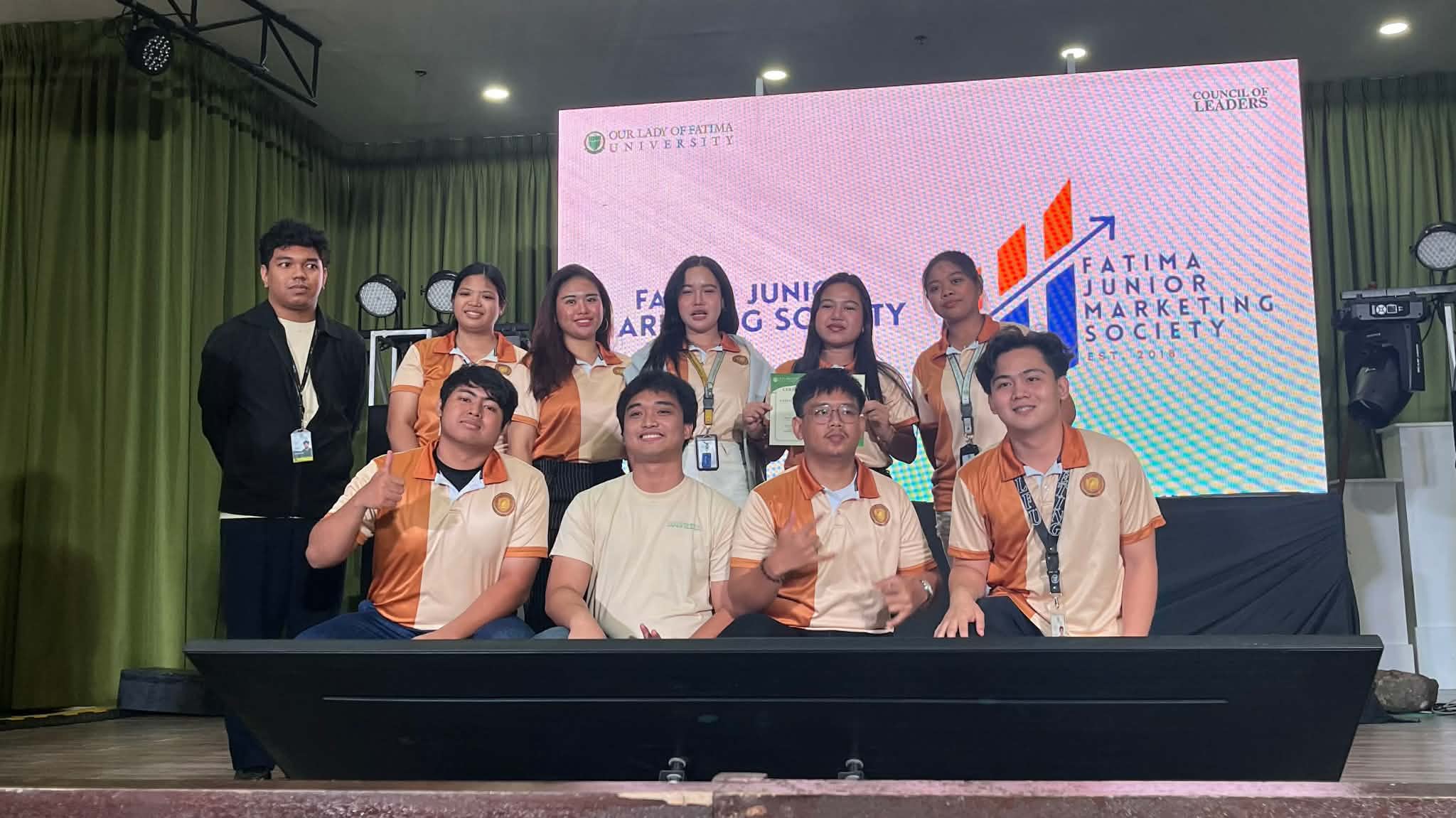 Fatima Junior Marketing Society on stage at the Council of Leaders